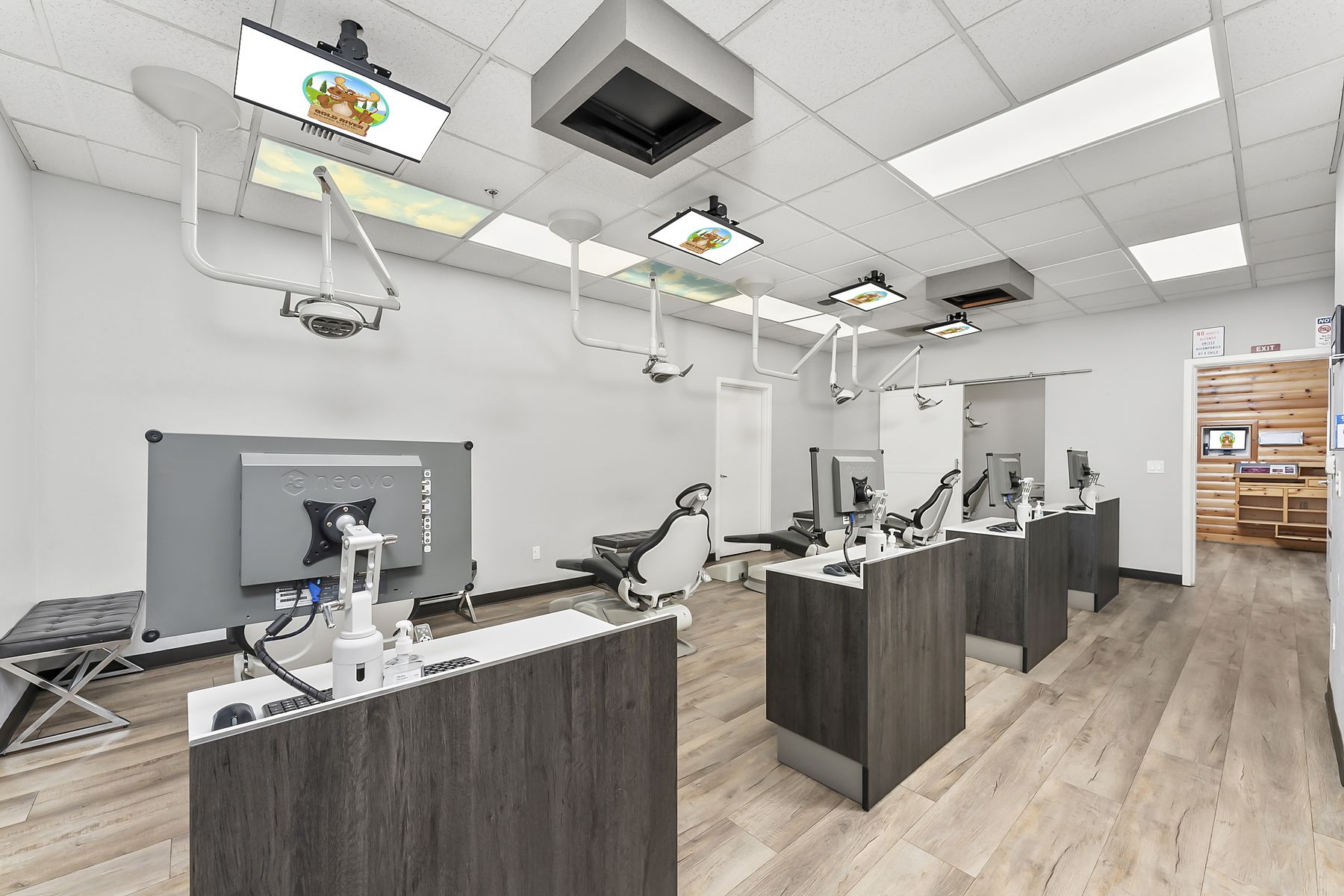 Open treatment bay with four chairs at Gold River Pediatric Dentistry